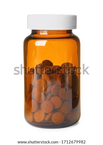 Bottle with vitamin pills isolated on white Royalty-Free Stock Photo #1712679982