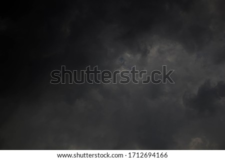 Dark sky is thunder-storm black and white clouds on a bad day during the rainy season. Space for copying idea text The feeling of intense air danced.