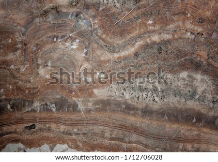 Natural marble stone texture with red nuances