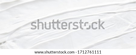 Skincare cosmetics and cream product texture or antibacterial liquid soap for hand washing for virus protection and hygiene, top view Royalty-Free Stock Photo #1712761111