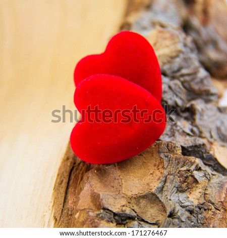 Hearts on Wooden Texture.