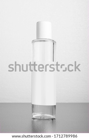 Hand sanitizer antibacterial liquid bottle in front of white background 