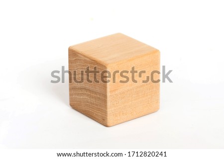 children's eco toys for toddlers, wooden cube isolated on a white background, the development of fine motor skills and thinking in children Royalty-Free Stock Photo #1712820241