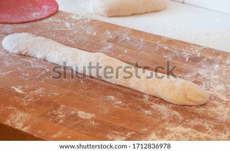raw homemade bread prepared for baking