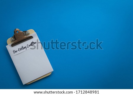 Pre-Existing Condition healthcare concept on clipboard flat lay copy space
 Royalty-Free Stock Photo #1712848981