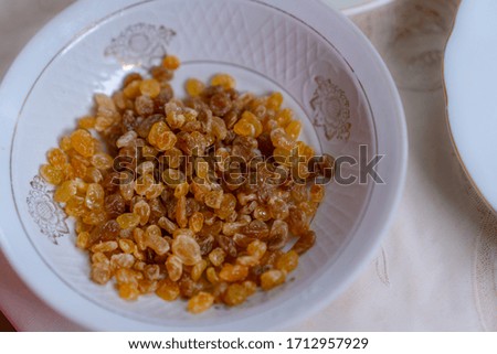 Raisins in a plate as a filling for buns