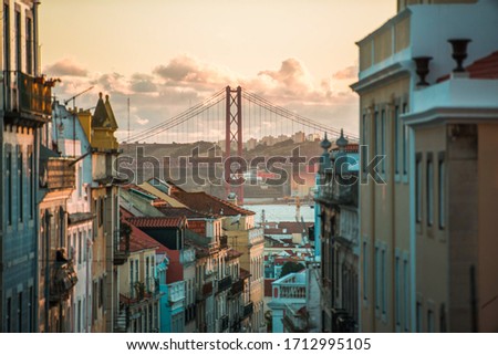 perfect sunset in Lisbon with the bridge in the background, an incredible postal and picture of one of the best capitals of Europe