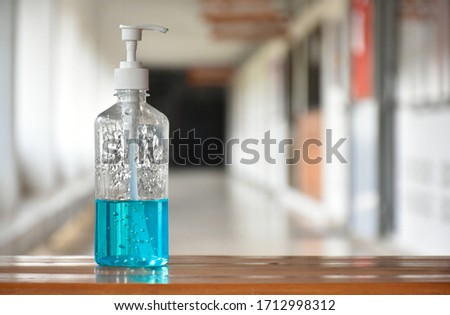 Hand sanitizer gel for hand hygiene Covid-19 or Coronavirus protection in front of the office's doors for the officers to clean hands before getting inside.
