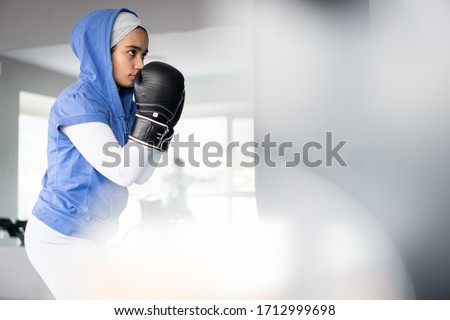 Female Arabic Kickboxer Fighter Training