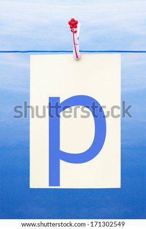 Seamless washing line with paper against a blue sky showing the letter p