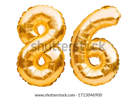 Number 86 eighty six made of golden inflatable balloons isolated on white. Helium balloons, gold foil numbers. Party decoration, anniversary sign for holidays, celebration, birthday, carnival