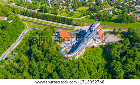 Beautiful panoramic aerial view photo from flying drone on Sigulda Bobsleigh and Luge Track in summer. Sigulda, Latvija 