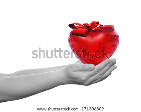 Concept or conceptual 3D red glass heart sign or symbol with a ribbon held in hands by a woman or child isolated over a white background as a metaphor for love,holiday, gift,care,valentine or romantic