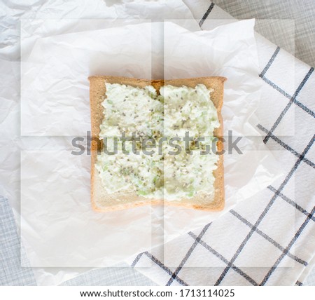 Stock Photo - Tasty sandwiche with toast bread, avocado and cottage cheese with blank business card. For design presentations and portfolios.