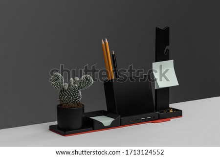 pen holder universal paper pencil phone hands office table black man organaizer