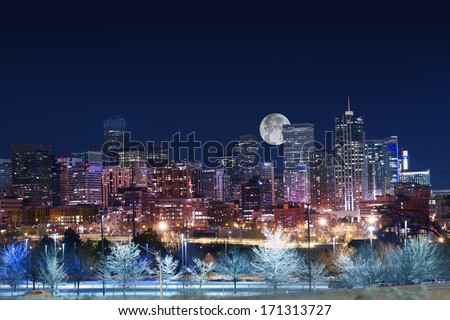 Denver Skyline West Side. Night in Colorado. Downtown Denver with Moon. United States.