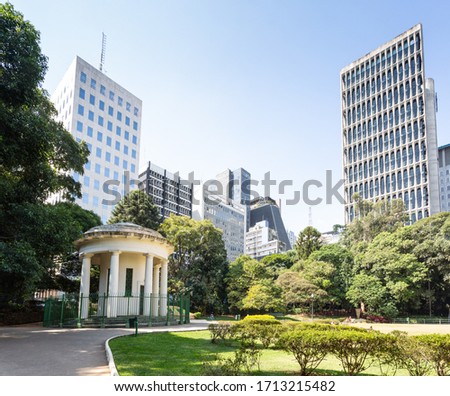 Partial view of the Trianon park in Sao Paulo with the buildings on Avenida Paulista in the background. Royalty-Free Stock Photo #1713215482