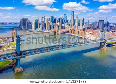 Two Bridges: Aerial view of the Manhattan Bridge, Brooklyn Bridge, and Lower Manhattan skyline along the East River