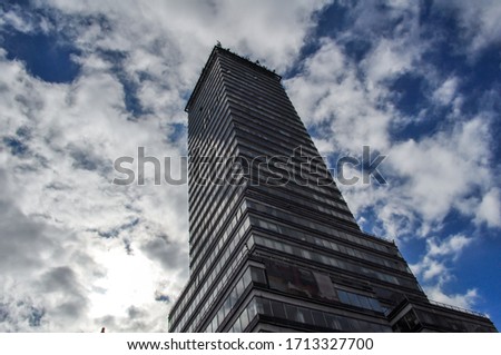 Modern tower under blue sky