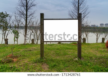 Blank sign board in the park