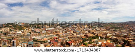 A view over Central Kampala from the vantage point of the minaret of the Old Kampala Mosque, one of the highest points in Kampala Royalty-Free Stock Photo #1713434887