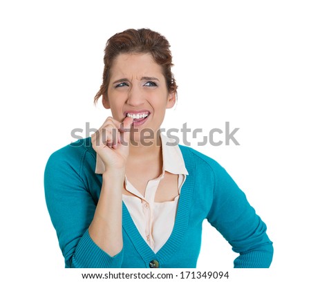 Closeup portrait of pretty woman with finger in mouth, sucking thumb, biting fingernail in stress, deep thought, isolated on white background. Negative emotion facial expression feeling. Body language