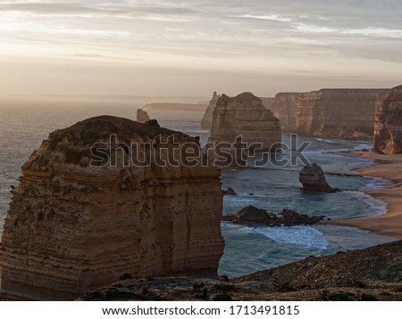 Telephoto lens picture of the famous 12 Apostles from the lookout at Sunset.  Shipwreck Coast,  Port Campbell National Park,  Victoria,  Australia.