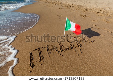 Italian flag on the beach.