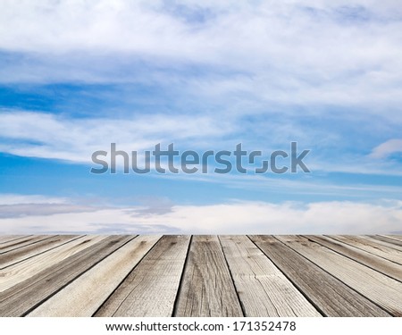 wood floor with cloud and blue sky