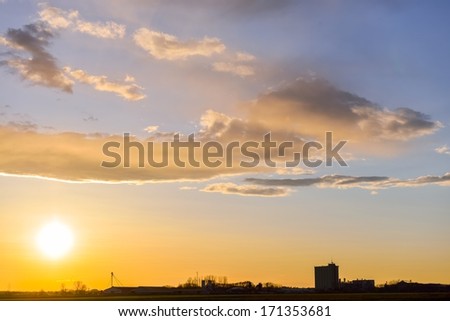 Artistic sunset with bright sky and clouds