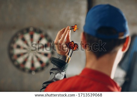 Darts game. Dart and target. Royalty-Free Stock Photo #1713539068