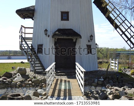 mill a dutch windmill standing on the river Bug in Brok in Masovia in Poland