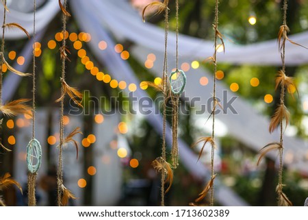 Dream catchers with bogey lights background.