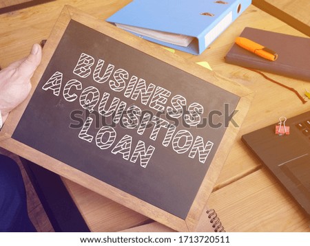 Business acquisition loan is shown on the business photo