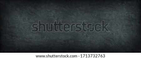 Black stone background. Dark gray wide banner with concrete wall surface texture. Royalty-Free Stock Photo #1713732763