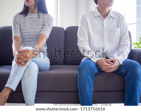 Couples are bored, stressed, upset and irritated after quarreling. Family crisis and relationship problems that come to an end Royalty-Free Stock Photo #1713756616