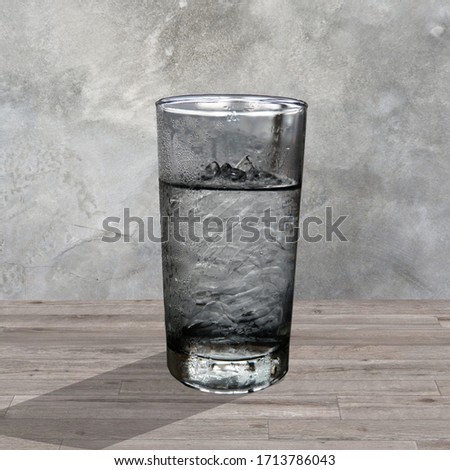 1 cup of cold water on a wooden table