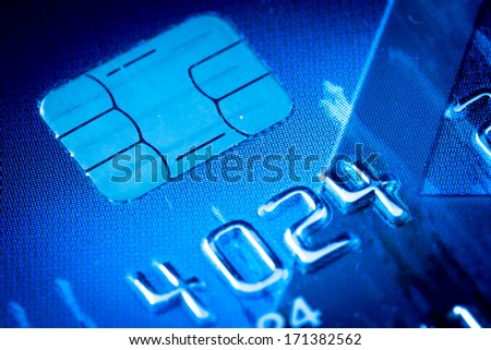 Credit card chip in blue Royalty-Free Stock Photo #171382562