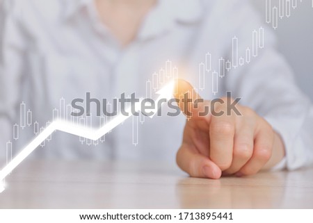 Business financial growth concept with graphs and arrow icons. Close up. Royalty-Free Stock Photo #1713895441
