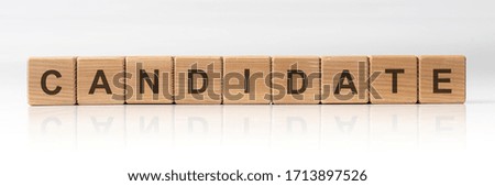 CANDIDATE Word Written In Wooden Cubes on white glossy background with reflection