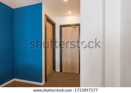 Entrance corridor interior in hotel apartment