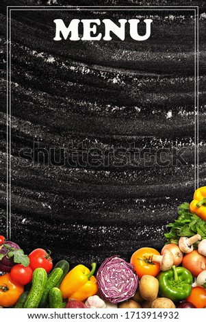Design of menu with black board and vegetables, space for text