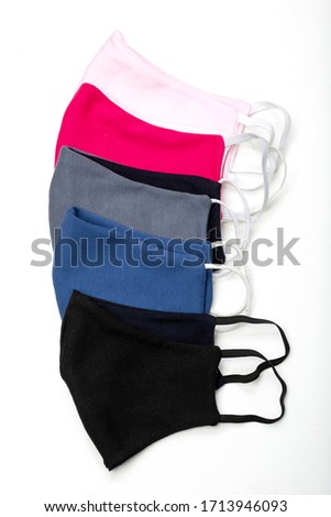 six protective face masks against coronavirus, grey, black, blue, red, pink, grey isolated on a white background