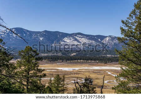 big valley near columbia lake with rocky mountains east kootenay Canada. Royalty-Free Stock Photo #1713975868