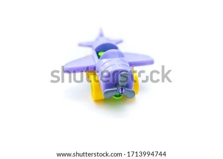 small color children`s airplane from the designer on a white background