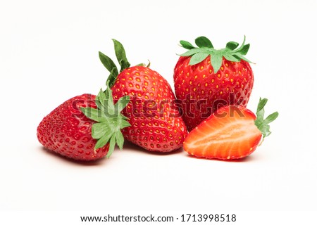 Fresh, red and tasty strawberries isolated on a white background Royalty-Free Stock Photo #1713998518