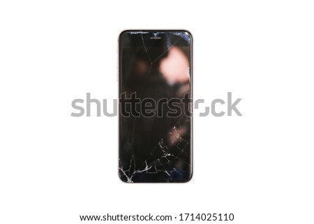 Broken smartphone glass. Cracks on the screen of the gadget. A broken mobile phone isolated on a white background. Phone service and repair.