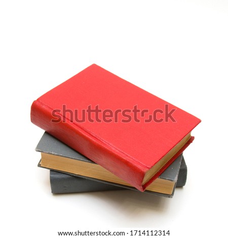 Three books on a white background 