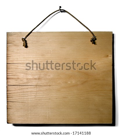 Wood sign: A blank piece of wood hanging from a nail.