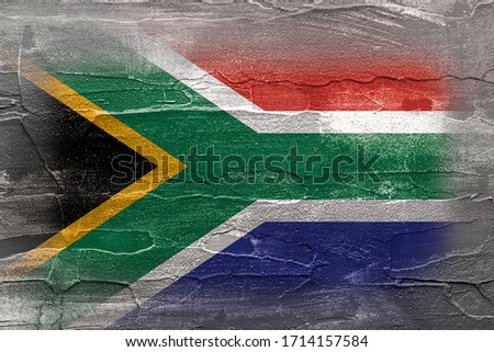 faded South African flag on a rustic background